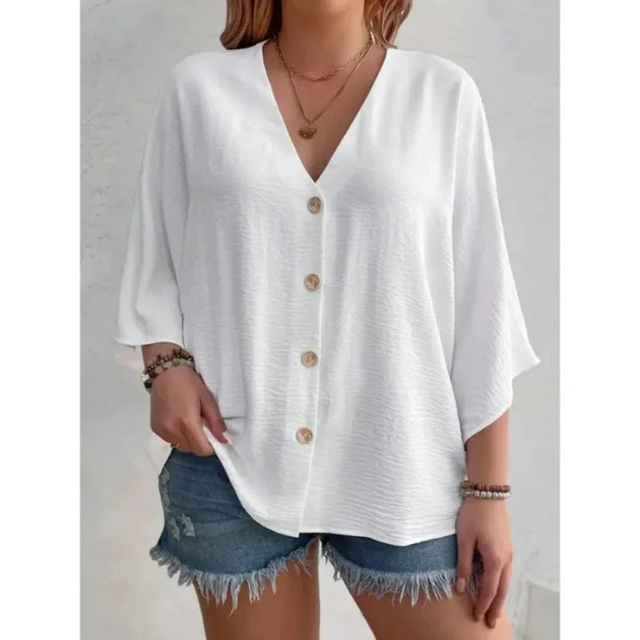 Quinn - Elegante top con anilla en V y botones