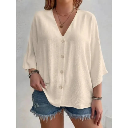 Quinn - Elegante top con anilla en V y botones